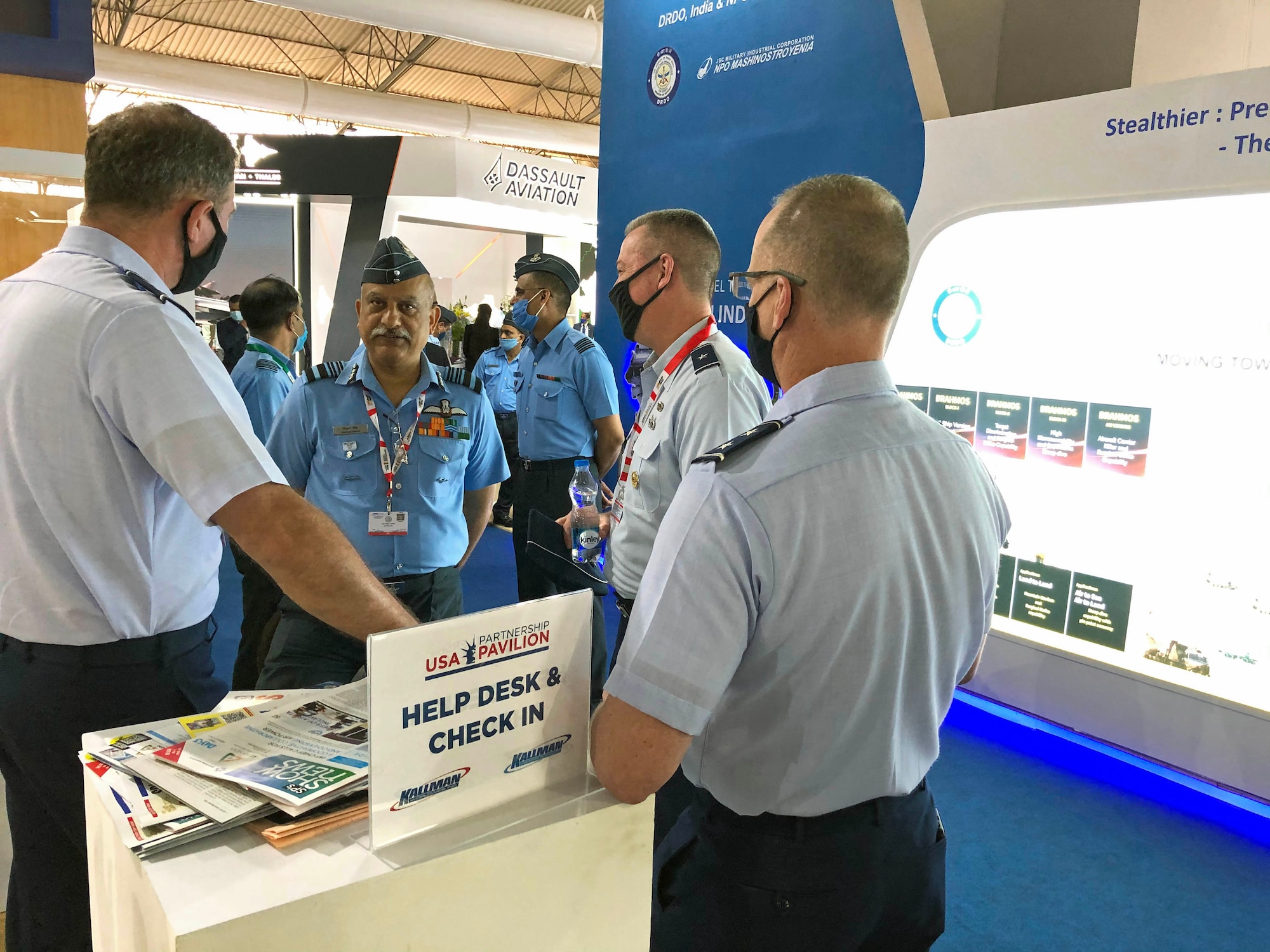 USAF and Indian air force officials discuss interoperability during Aero India 2021.
