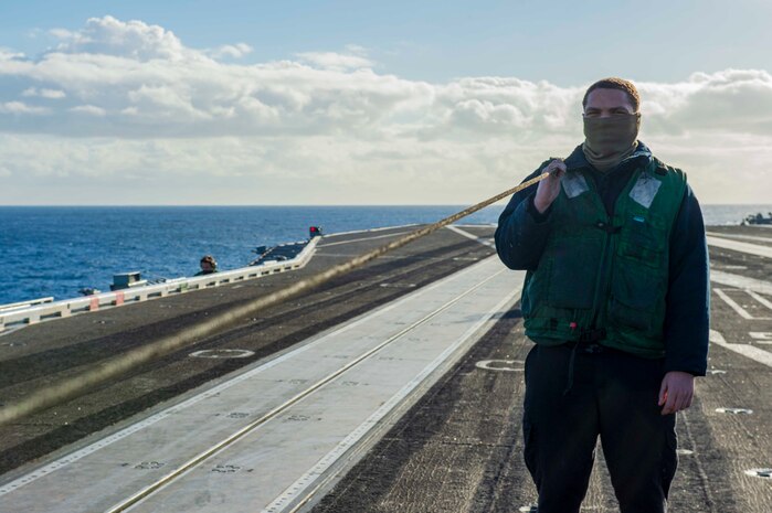 210228-N-OB471-1062 ATLANTIC OCEAN (Feb. 28, 2021) Airman Noah Fitzhugh, from San Mateo, California, performs maintenance on a catapult aboard the Nimitz-class aircraft carrier USS Dwight D. Eisenhower (CVN 69), in the Atlantic Ocean, February 28, 2021. Ike is on a routine deployment supporting U.S. national security interests in Europe and increasing theater cooperation and forward naval presence in the U.S. 6th fleet area of operations. (U.S. Navy photo by Mass Communication Specialist Seaman Jacob Hilgendorf/Released)