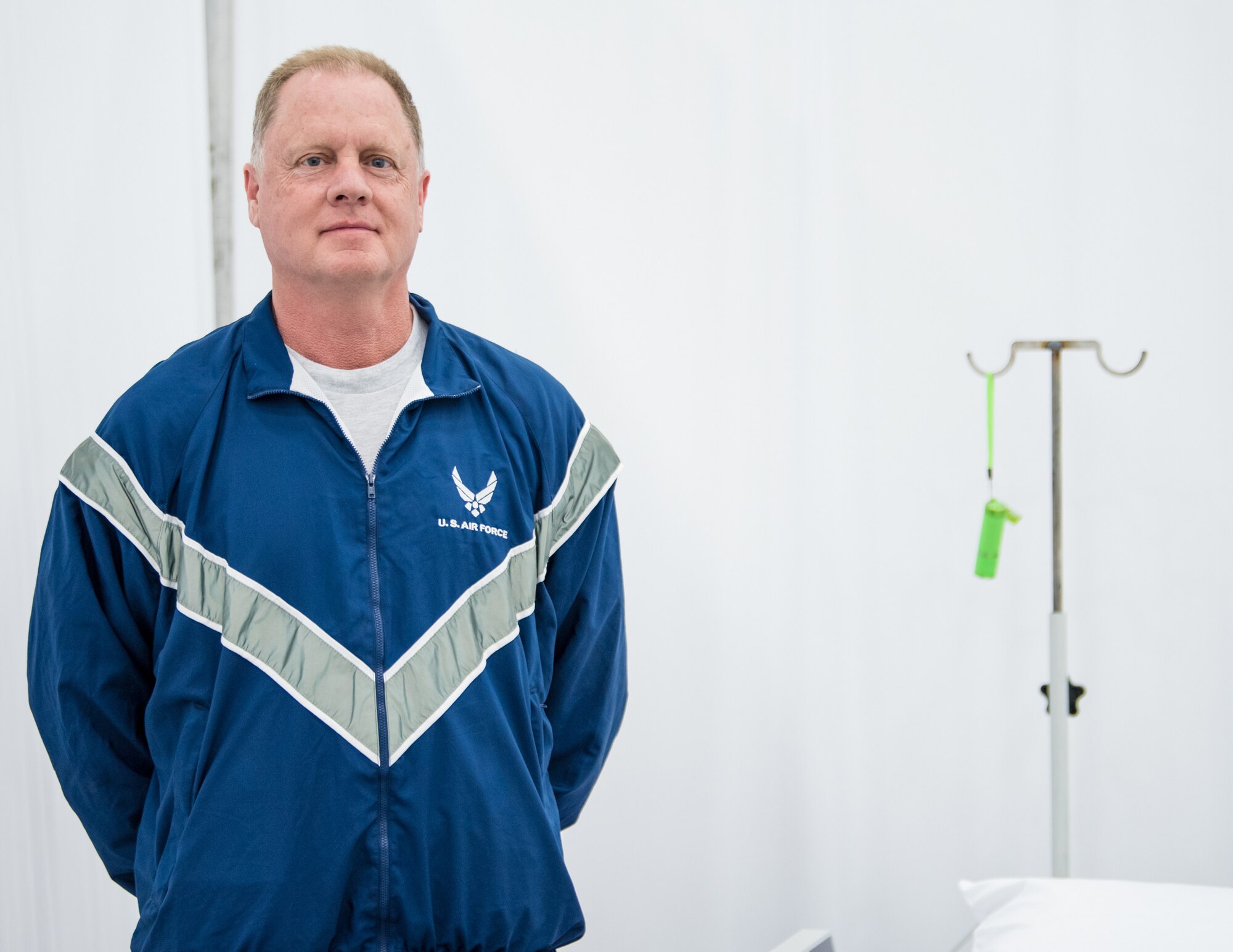 Maj. Anthony Gardner, a clinical nurse manager at the Louisville VA Medical Center, left his civilian employment to serve as the chief nurse for the 123rd Medical Group Detachment 1 at the Kentucky Fair and Exposition Center in Louisville, Ky., April 13, 2020. Gardner is currently working at an alternate care facility here. The facility is designed to assist patients recovering from COVID-19 should area hospitals reach capacity. (U.S. Air National Guard photo by Senior Airman Chloe Ochs)