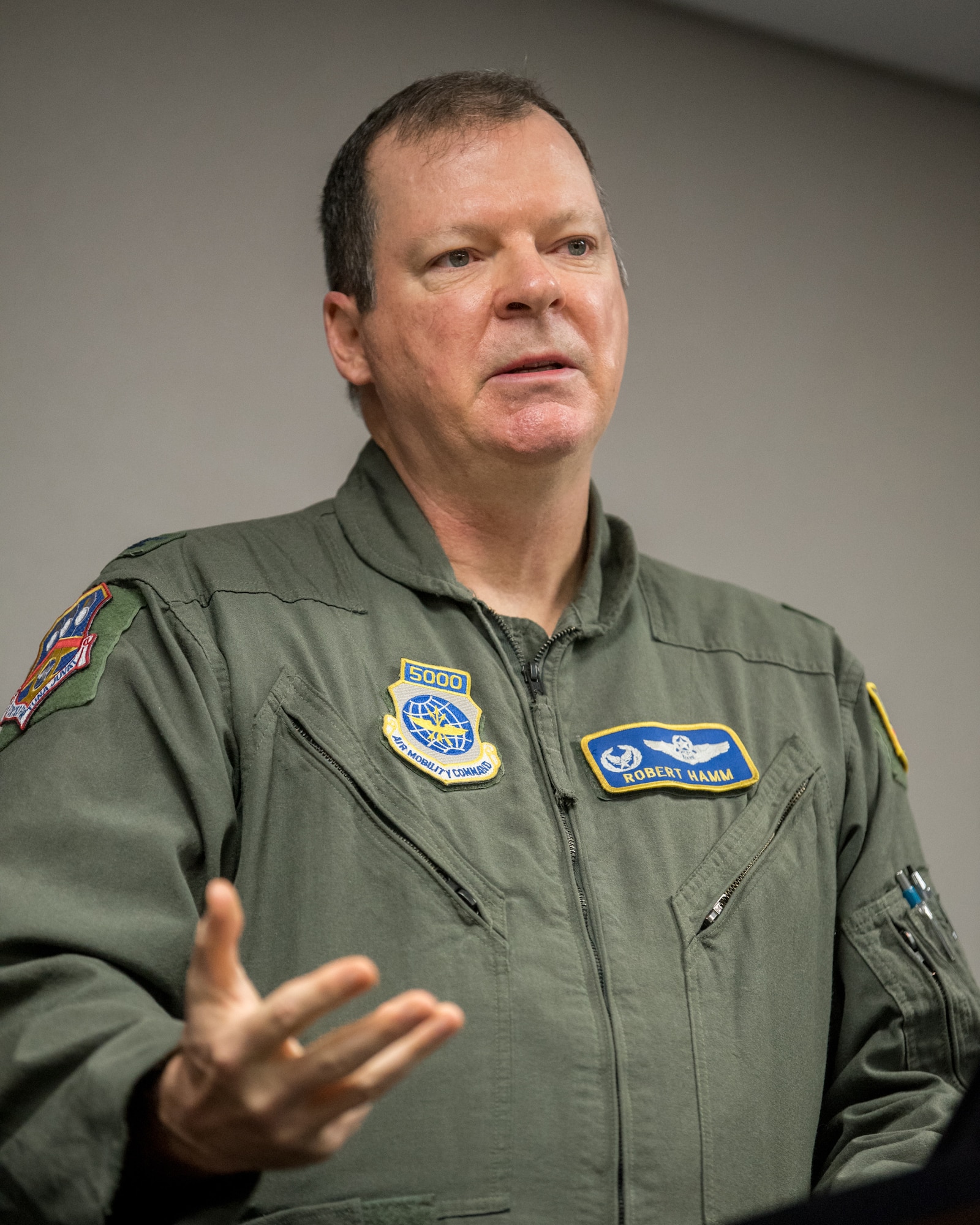 Col. Robert Hamm, outgoing commander of the 123rd Operations Group, speaks at the 123rd Operations Group change-of-command ceremony at the Kentucky Air National Guard Base in Louisville, Ky., on Aug. 8, 2020. Replacing Hamm is Lt. Col. Matthew E. Quenichet. (U.S. Air National Guard photo by Staff Sgt. Joshua Horton)