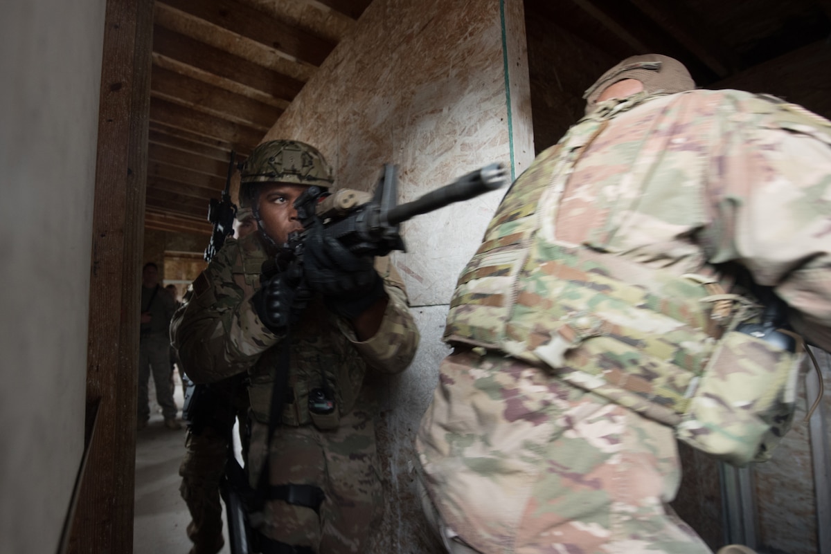 A member of the Kentucky Air National Guard’s 123rd Security Forces Squadron practices clearing a building in Alpena, Mich., Aug 19, 2020. The Airmen spent a week at Alpena Combat Readiness Training Center to prepare them for domestic operations and law enforcement assistance. (U.S. Air National Guard photo by Phil Speck)