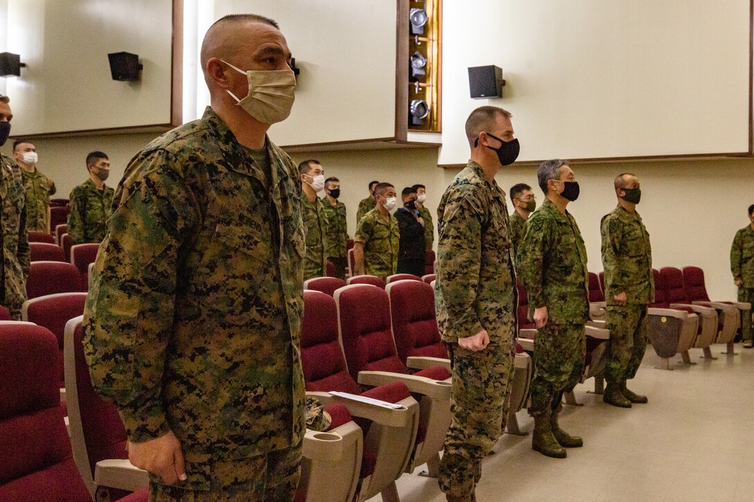 U.S. Marines and Japan Ground Self-Defense Force service members conduct the opening ceremony of Exercise Yama Sakura 79 on Camp Courtney, Okinawa, Japan, Dec. 8, 2020.