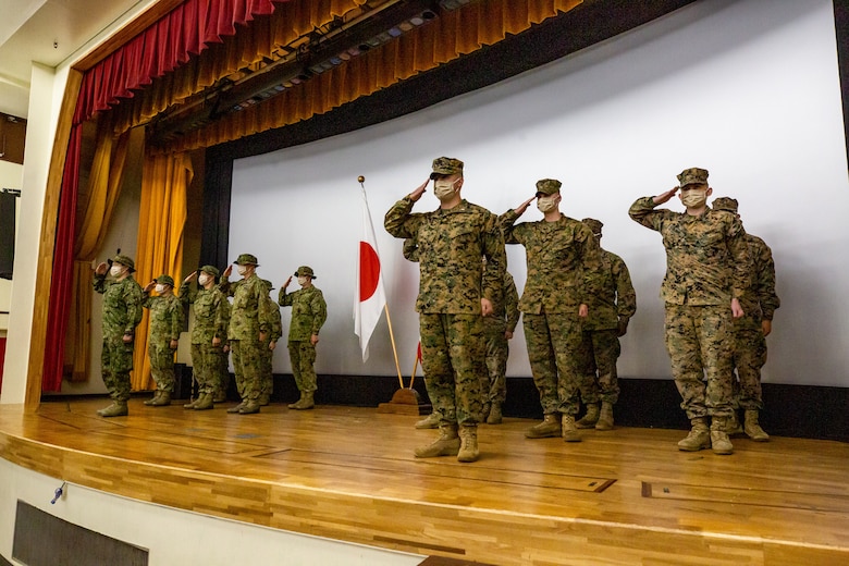 U.S. Marines and Japan Ground Self-Defense Force service members conduct the opening ceremony of Exercise Yama Sakura 79 on Camp Courtney, Okinawa, Japan, Dec. 8, 2020.