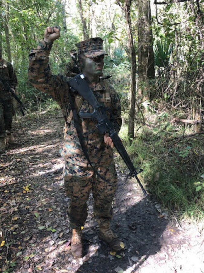 Midshipman 3rd Class Michael Johnson, a recipient of the Naval Reserve Officers Training Corps (NROTC) Scholarship and sophomore at Louisiana State University, participates in a field training exercise in Baton Rouge, Louisiana, Nov. 22, 2019.