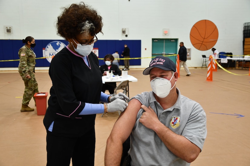 First Fort Lee employee vaccinated for COVID19 says the