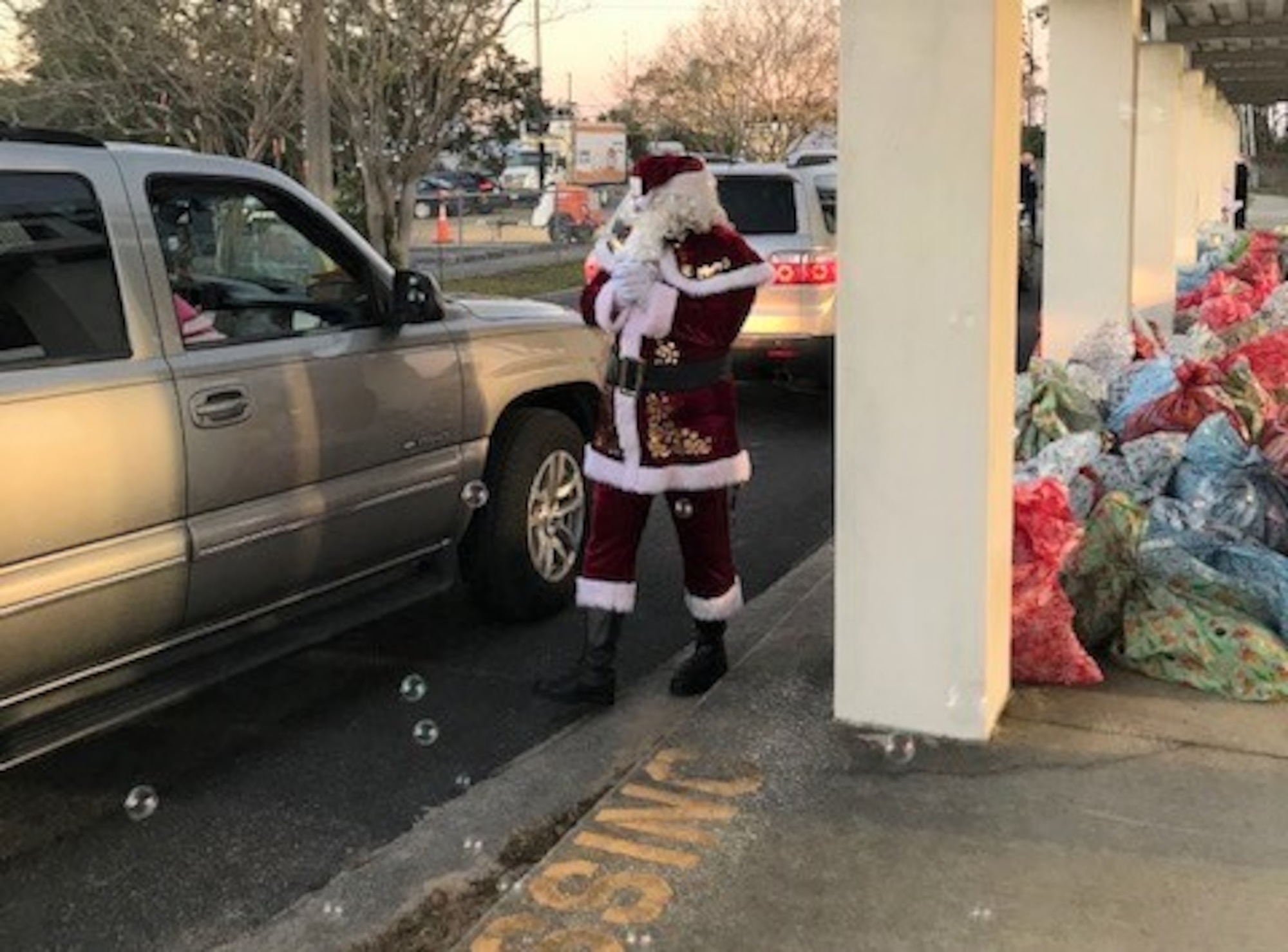 Santa surprises children during Spread the Joy.