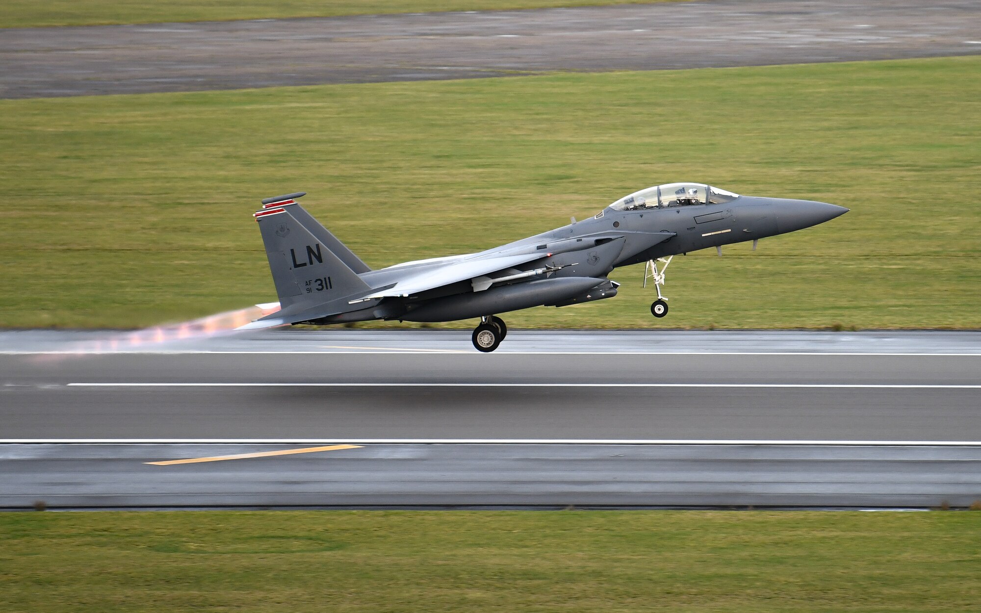 An F-15E Strike Eagle assigned to the 494th Fighter Squadron takes off for the first time in the new year at Royal Air Force Lakenheath, England, Jan. 5, 2021.  The 48th Fighter Wing maintains combat readiness through daily training, ensuring the ability to provide superior airpower capabilities in support of United States interests and those of their allies and partners.  (U.S. Air Force photo by Senior Airman Madeline Herzog)