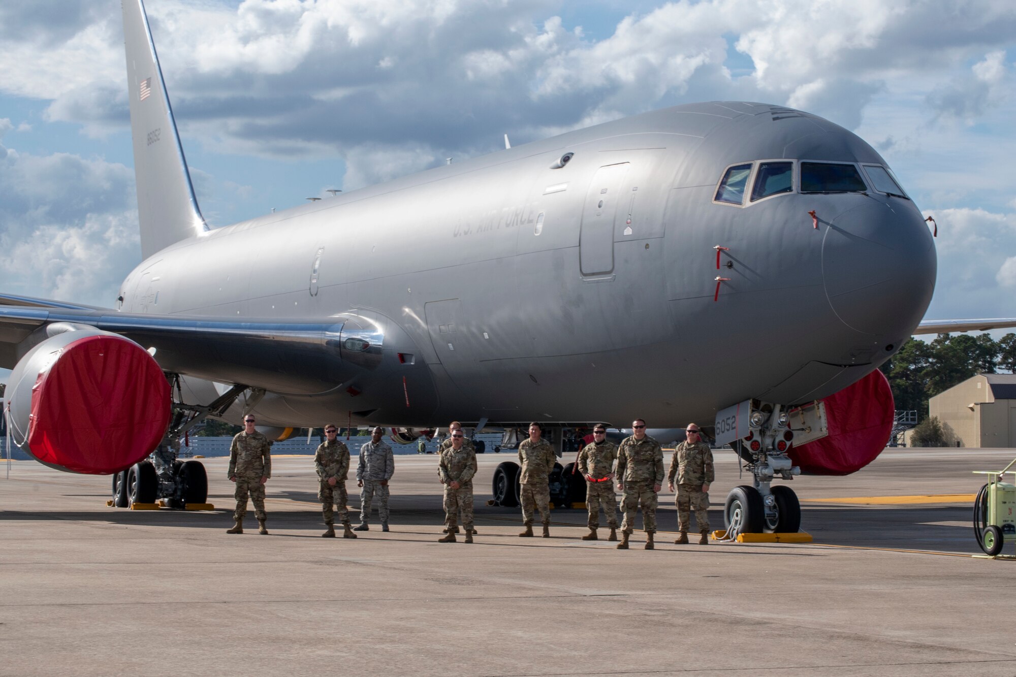 MSgt. Corey Lawson, 916th Aerial Refueling Wing KC-46A Pegasus dedicated crew chief, stands center surround by the maintenance crew he credits with helping achieve zero discrepancies during an inspection of tail 6052 on October 22, 2020.