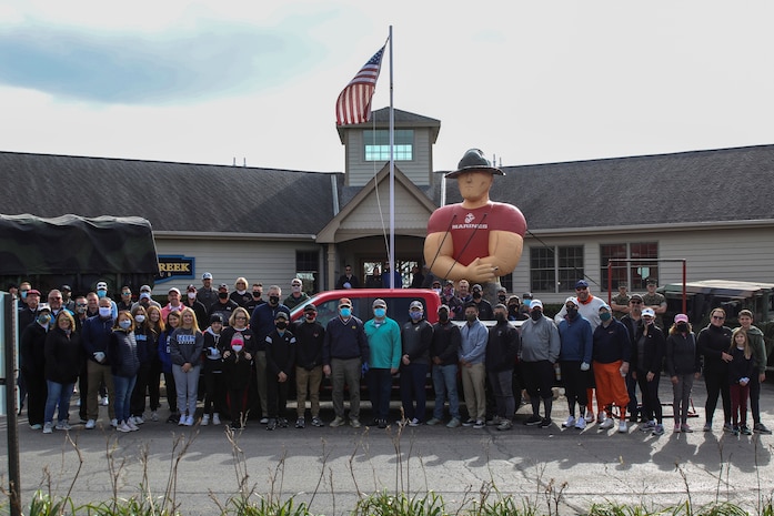 U.S. Marines with Recruiting Sub-Station Palatine, Recruiting Station Chicago, 9th Marine Corps District, pose for a group photo with other participates at Hughes Creek Golf Club in Elburn, IL, Oct. 16, 2020. The Marines participate in the support of Toys for Tots golf outing. (U.S. Marine Corps photo by Sgt. Robert Gavaldon)