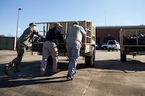 JOINT BASE LANGLEY-EUSTIS, Va. (January 4, 2021) Joint Task Force Civil Support members roll a generator into position before setting up a command post tent as part of an equipment check in preparation for the command’s upcoming exercise Sudden Response 21.