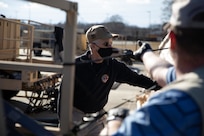 JOINT BASE LANGLEY-EUSTIS, Va. (January 4, 2021) Randy Hall, left, and John Cronin, both assigned to Joint Task Force Civil Support’s training department, secure a tent as part of an equipment check in preparation for the command’s upcoming exercise Sudden Response 21.
