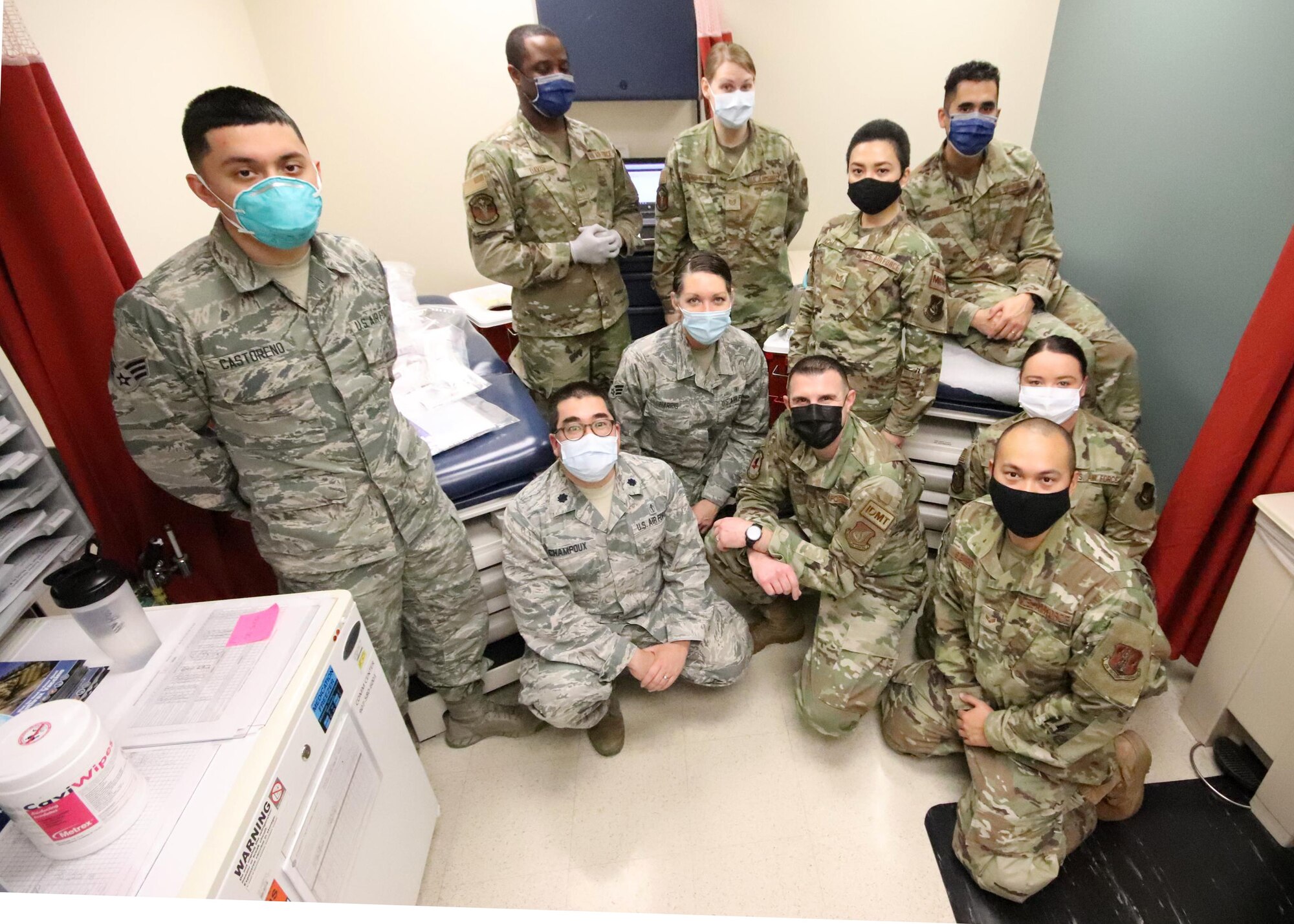 U.S. Airmen with the 673d Medical Group pause for a photo after preparing to administer the COVID-19 vaccine at Joint Base Elmendorf-Richardson, Alaska, Dec. 31, 2020. Upon receiving the initial shipment of the vaccine, JBER began inoculating personnel following the Centers for Disease Control and Prevention’s prioritization guidelines. The vaccine is part of Operation Warp Speed, a national initiative to accelerate the development, production and distribution of safe and effective COVID-19 vaccines, therapeutics and diagnostics.