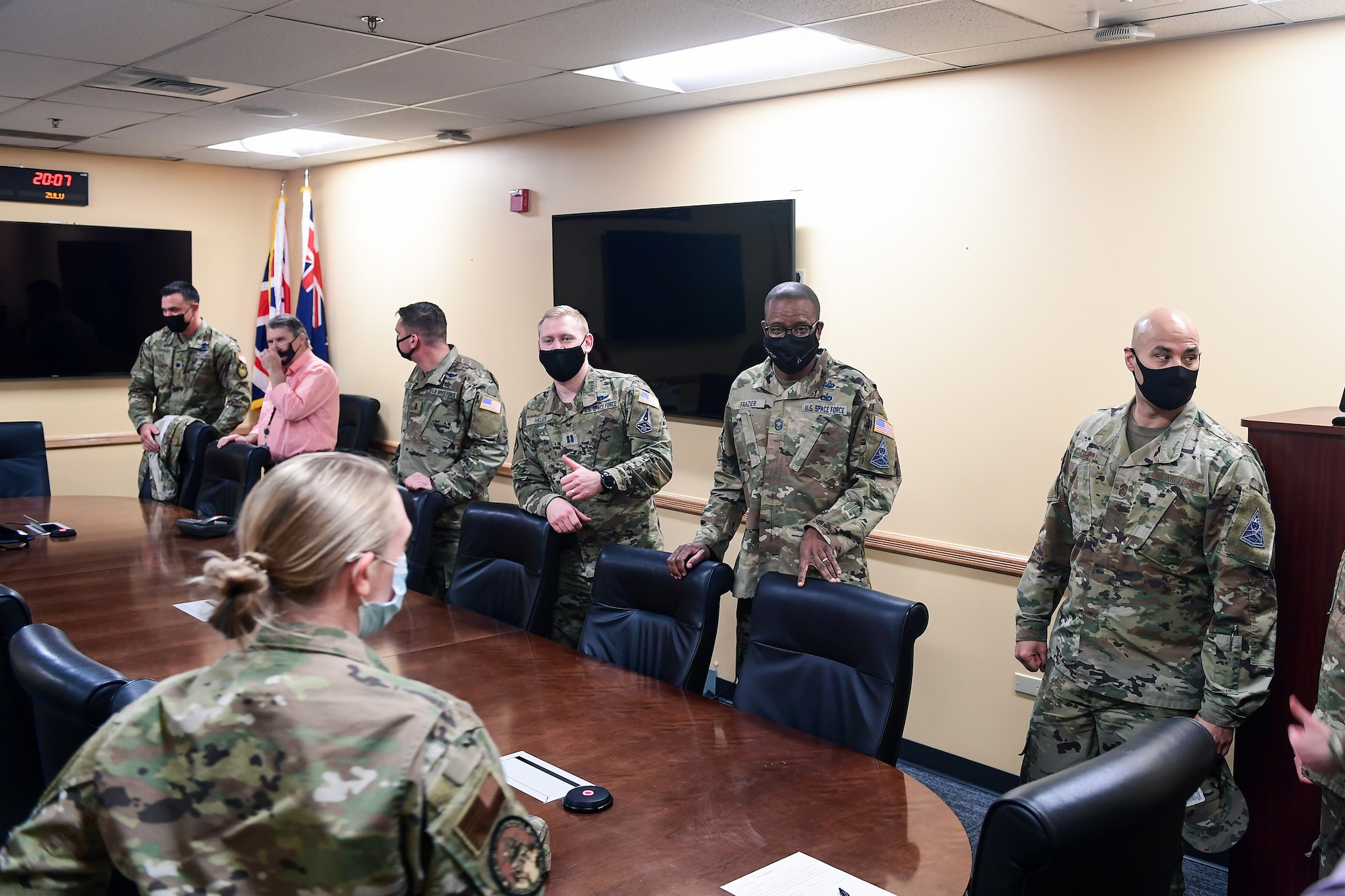 Colleagues of Col. Richard Bourquin, Space Delta 4 commander, gather to celebrate Bourquin’s commissioning into the U.S. Space Force in the DEL 4 conference room on Buckley Air Force Base, Colo., Jan. 5, 2021.