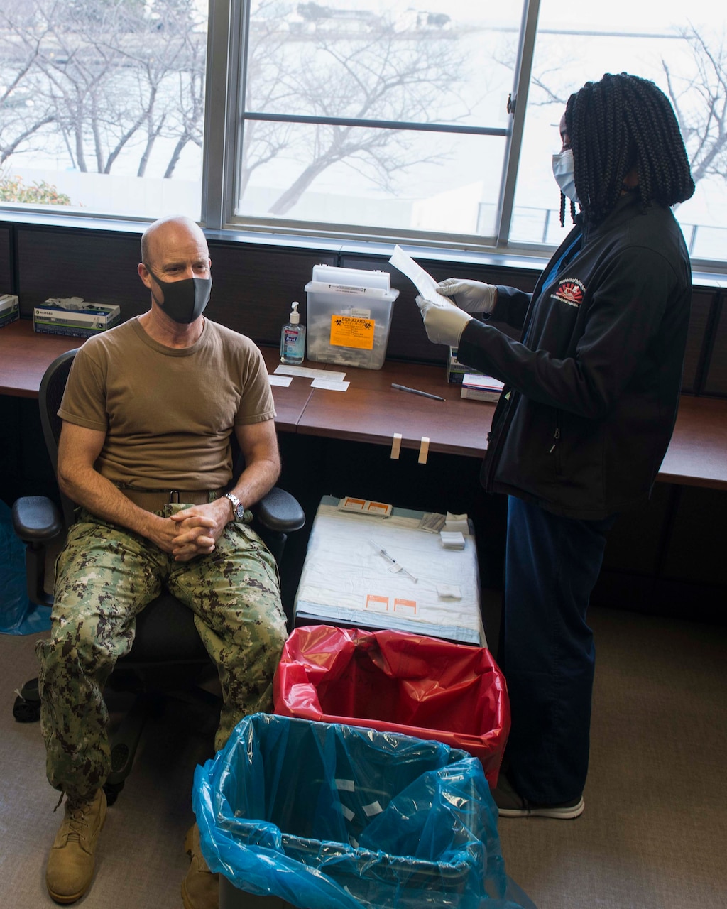 210105-N-MM501-1031 YOKOSUKA, Japan - Vice Adm. Bill Merz, Commander, U.S. 7th Fleet prepares to receive the COVID-19 vaccine at U.S. Naval Hospital Yokosuka. Medical personnel and strategic forces were the first to receive the COVID-19 vaccine over the past week at Naval Hospital Yokosuka. This is part of the DoD’s phased vaccine rollout for voluntary inoculations across the force, including the 7th Fleet’s Forward Deployed Naval Forces. As the U.S. Navy's largest forward deployed fleet, with its approximate 50-70 ships and submarines, 140 aircraft, and 20,000 Sailors in the area of operations at any given time, 7th Fleet conducts forward-deployed naval operations in support of U.S. national interests throughout a free and open Indo-Pacific area of operations to foster maritime security, promote stability, and prevent conflict alongside 35 other maritime nations and partners. (U.S. Navy photo by Mass Communication Specialist 2nd Class Shannon Burns)