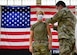 Airman administers vaccine shot to a service member.