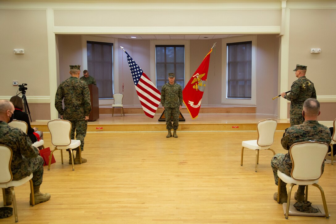 U.S. Marines and civilians attend the relief and appointment ceremony for Marine Corps Installations East-Marine Corps Base Camp Lejeune at the Marston Pavilion on MCB Camp Lejeune, North Carolina, Dec. 21, 2020. Sgt. Maj. Charles A. Metzger, outgoing sergeant major for MCIEAST-MCB Camp Lejeune, relinquished his duties to Sgt. Maj. Robert M. Tellez, incoming sergeant major and retired after 30 years of honorable service to the Marine Corps. (U.S. Marine Corps photo by Cpl. Ginnie Lee)