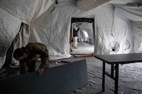 JOINT BASE LANGLEY-EUSTIS, Va. (January 6, 2021) Joint Task Force Civil Support members pack up equipment during a tent breakdown at the conclusion of an equipment check in preparation for the command’s upcoming exercise Sudden Response 21.