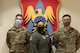 From left: Airman 1st Class James Gehne, 375th Civil Engineer Squadron firefighter, Master Sgt. Renee Cheatham, 375th Aeromedical Evacuation Squadron technician, and Senior Airman Matthew Smith, 375th Security Forces patrolman, are the first three members of Team Scott to receive a COVID-19 inoculation on Scott Air Force Base, Ill., Jan 6, 2021. The Department of Defense prioritizes personnel to receive the vaccines based on Center of Disease Control guidance and the DoD COVID Task Force’s assessment of unique DoD mission requirements. The DoD Prioritization Schema prioritizes those providing direct medical care, maintaining essential national security and installation functions, deploying forces and beneficiaries at the highest risk for developing serious illness before other members of the DoD population. (U.S. Air Force photo by Tech. Sgt. Jordan Castelan)