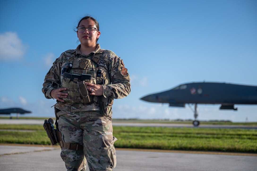 Airman 1st Class Audrey Taylor, 28th Security Forces Squadron response force leader, poses for a photo at Andersen Air Force Base, Guam, in support of a Bomber Task Force mission, Dec. 26, 2020. Security Forces Airmen patrol the flightline to ensure security and guidelines are maintained. (U.S. Air Force photo by Senior Airman Tristan Day)