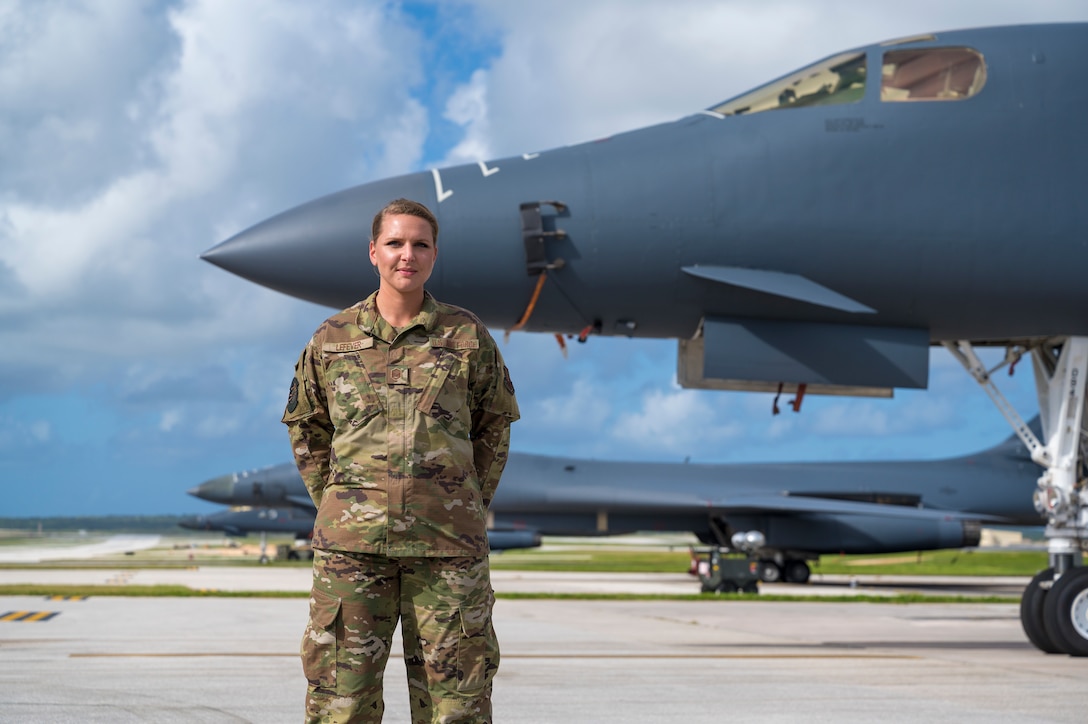 Master Sgt. Erin Lefever, 28th Aircraft Maintenance Squadron Bomber Task Force project officer, poses in front of a U.S. Air Force B-1B Lancer, at Andersen Air Force Base, Guam, in support of a Bomber Task Force mission, Jan. 4, 2021. As the BTF project officer, Lefever coordinates the logistics for the 28th Maintenance Group personnel prior to arrival and throughout the trip, such as cargo prep and any additional coordination with the Andersen team regarding maintenance personnel. (U.S. Air Force photo by Airman 1st Class Austin McIntosh)