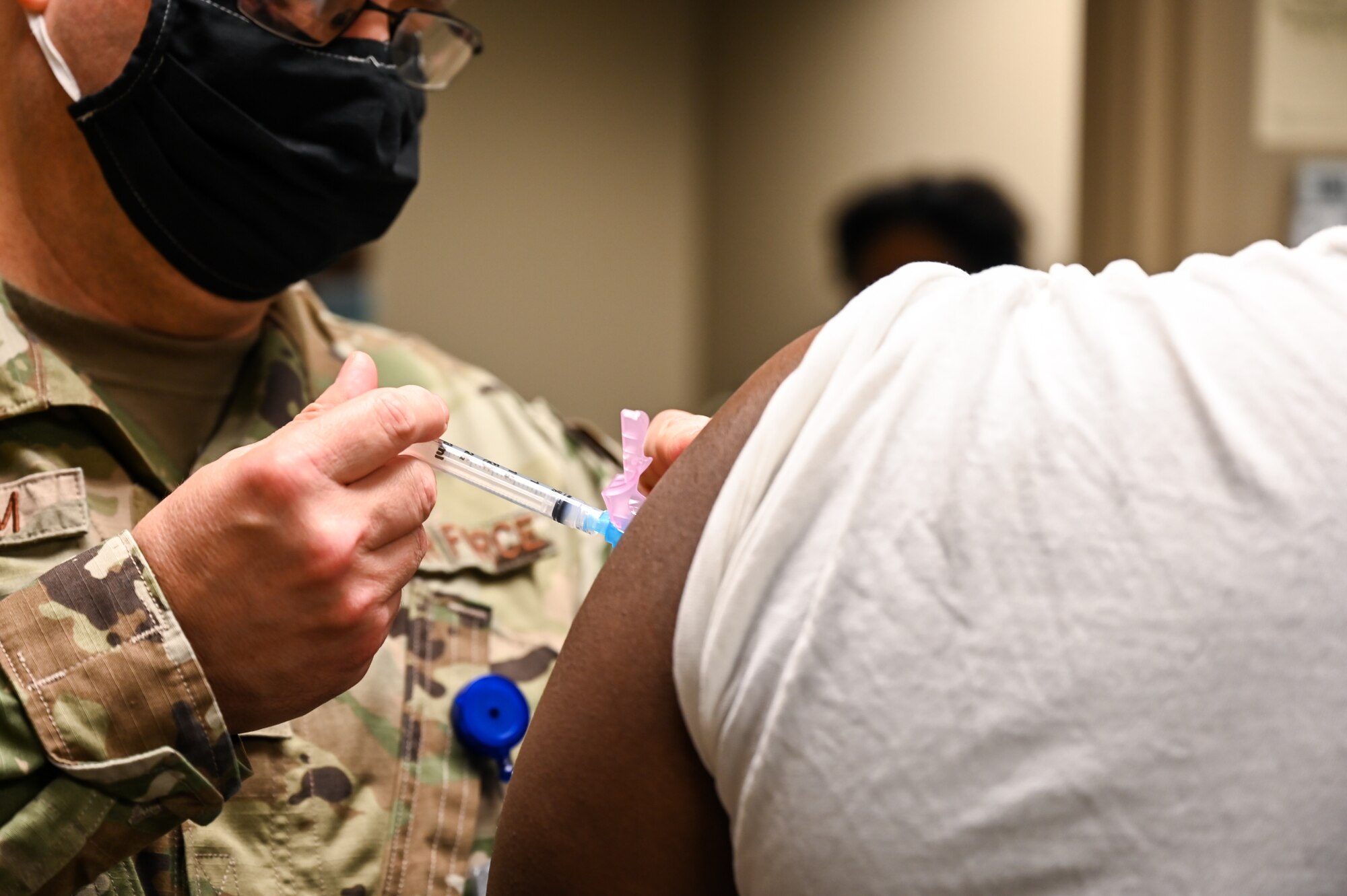 Airmen from the 2nd Medical Group receive the first doses of the COVID-19 vaccination at Barksdale Air Force Base, La., Jan. 6, 2021. The Department of Defense continues to deliver on the Acting Secretary of Defense’s priorities during the COVID-19 pandemic to protect its people, maintain readiness and support the national COVID-19 response. (U.S. Air Force photo by Senior Airman Christina Graves)