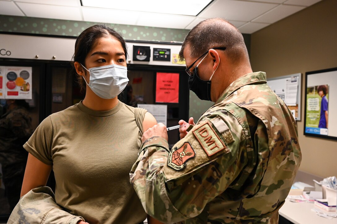 Airmen from the 2nd Medical Group receive the first doses of the COVID-19 vaccination at Barksdale Air Force Base, La., Jan. 6, 2021.