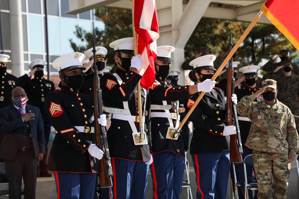 U.S. Marines with MARFOR-K color guard present colors during the MARFOR-K Cake Cutting Ceremony.