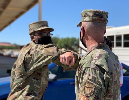 Azzano greets Airman.