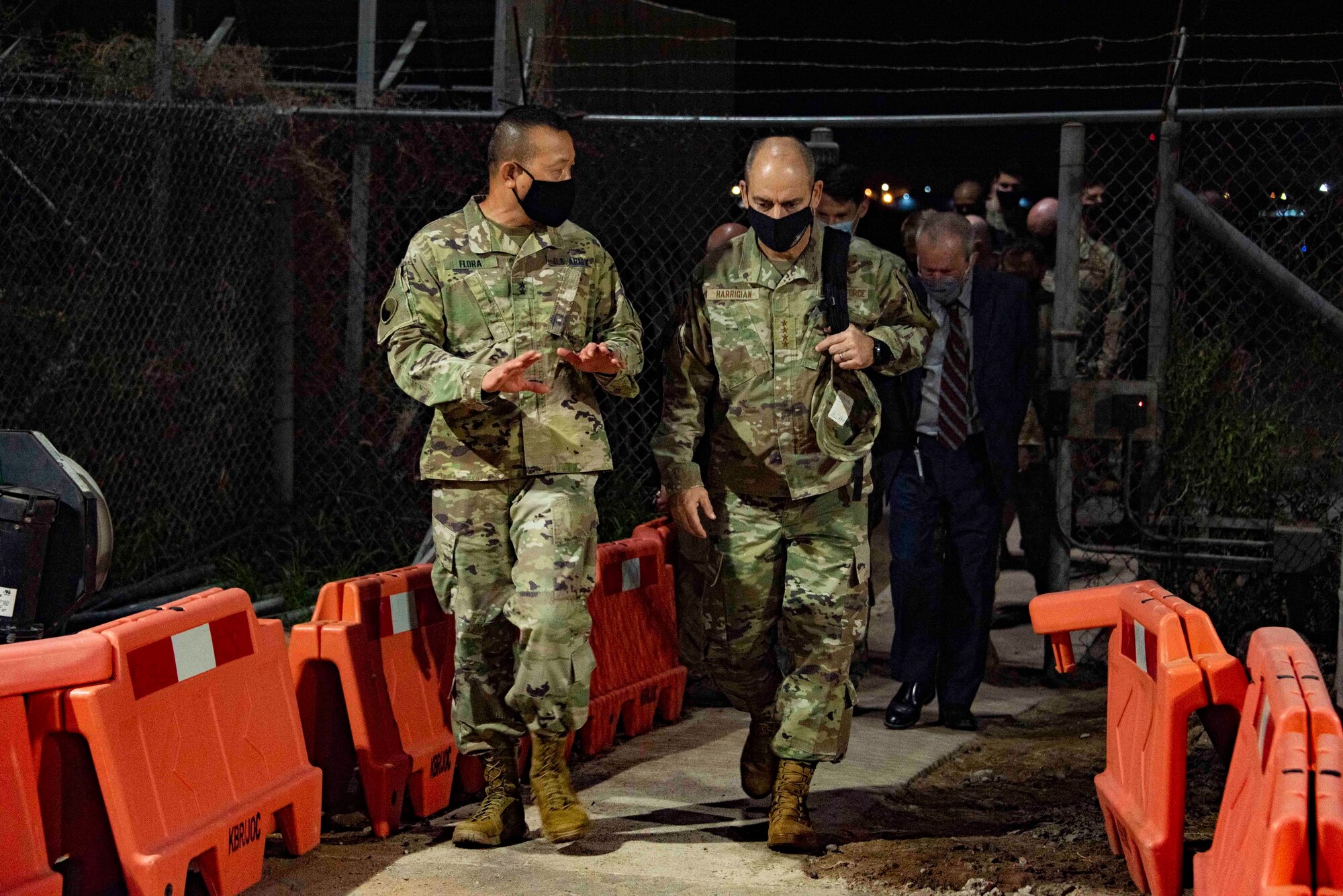 U.S. Army Maj. Gen. Lapthe Flora, commanding general, Combined Joint Task Force – Horn of Africa, escorts U.S. Air Force Gen. Jeffrey Harrigian,  U.S. Air Forces in Europe and Air Forces Africa commander, Jan. 4, 2020, at Camp Lemonnier, Djibouti. Harrigian arrived at CLDJ as part of a battlefield circulation to East Africa. (U.S. Air Force photo by Senior Airman Kristin Savage)