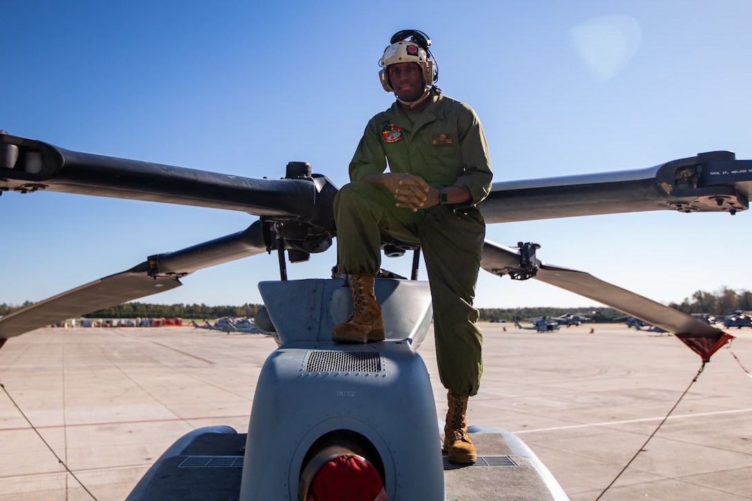 Sgt. Jamir K. Smith, an avionics technician with Marine Light Attack Helicopter Squadron 167, Marine Aircraft Group 29, 2nd Marine Aircraft Wing, poses for a photo at Marine Corps Air Station New River, N.C. , November 17, 2020. "It's better to be prepared for an opportunity and not have one, than have an opportunity and not be prepared," said Smith, a Brooklyn, N.Y., native. According to his leadership, Smith's guidance resulted in 689 maintenance action form sign-offs, accounting for over 3,149 maintenance man-hours completed with in the avionics department. (U.S. Marine Corps photo by Lance Cpl. Elias E. Pimentel III)