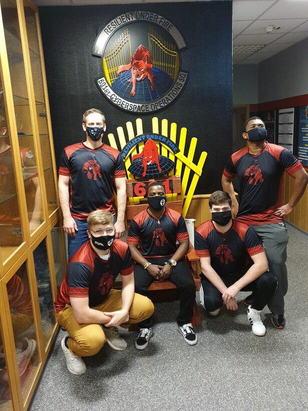 Members of the Hellhound Gamers, the 691st Cyberspace Operations Squadron’s eSports team, pose for a photo at Ramstein Air Base, Germany, Dec. 5, 2020.
