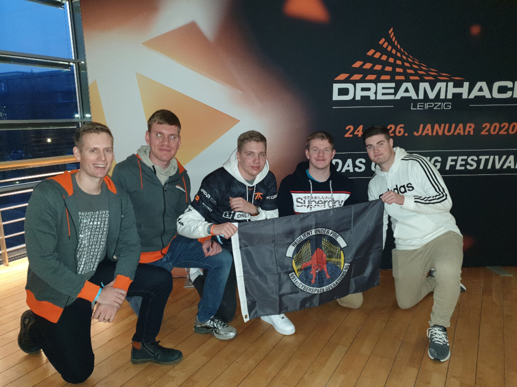 Members of the Hellhound Gamers, the 691st Cyberspace Operations Squadron’s eSports team, pose for a photo at an eSports tournament at Leipzig, Germany, January 2020.
