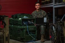 Lance Cpl. Marco A. Cerda, a network administrator with Combat Logistics Regiment 2, 2d MLG, poses for a photo on MCB Camp Lejeune, N.C., January 5, 2020. "Take the good, remove the bad, and add your own mix," said Cerda, a San Juan, Texas, native. According to his leadership, Lance Cpl. Cerda is being recommended for Motivator of the Week for actions while serving as the noncommissioned officer in-charge of the Network on the Move asset. He takes initiative and sets the example for his peers to emulate with his positive attitude and motivation. Lance Cpl. Cerda has become an asset to both the communications section and CLR-2 with his uncommon dedication to the mission. (U.S. Marine Corps photo by Lance Cpl. Scott Jenkins)