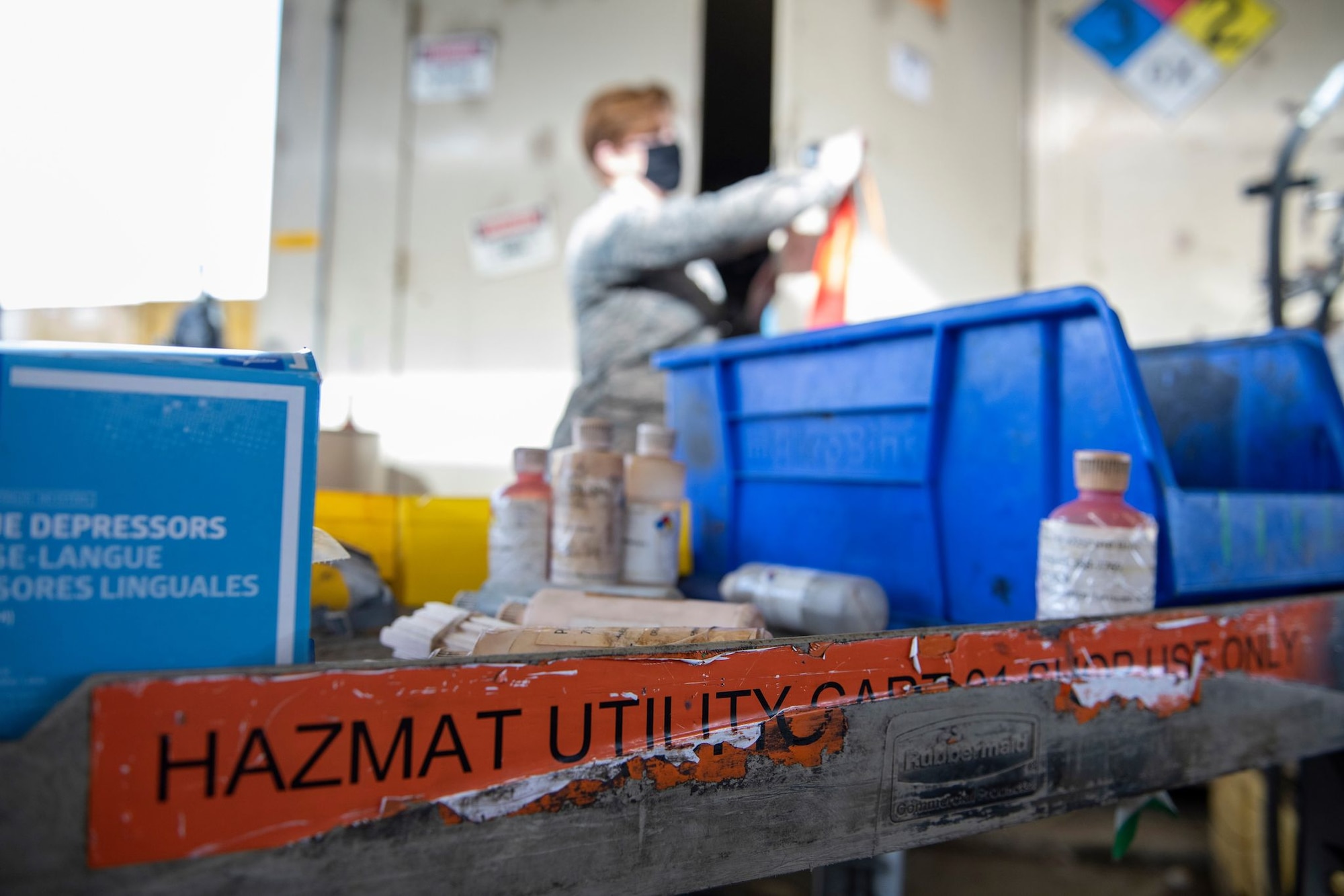 Airman 1st Class Hannah Kinter, 9th Aircraft Maintenance Squadron (AMXS) support technician, opens hazardous material storage to organize and store hazardous material on Beale Air Force Base.