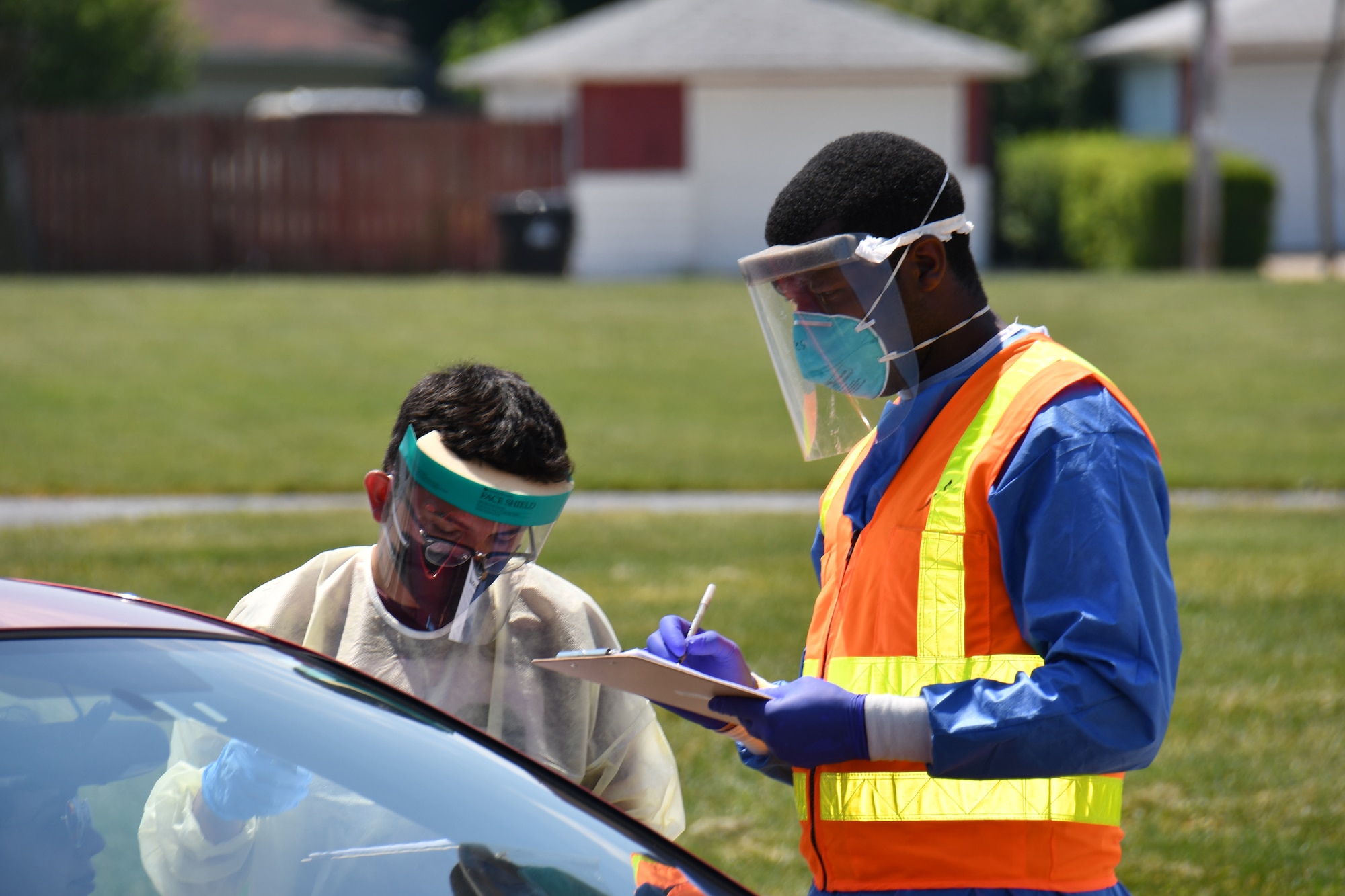 Wisconsin's Adjutant General Maj. Gen. Paul Knapp visited Soldiers and Airmen assigned to specimen collection sites in Racine County June 19, 2020. Specimen collection is one of numerous missions the Wisconsin National Guard has taken on to support the state's effort to mitigate spread of the COVID-19 virus. (U.S. Air National Guard photo by Master Sgt. Paul Gorman)