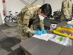 Nevada National Guardsmen conducted a sample collection site for COVID-19 testing in downtown Reno Jan. 7, 2021, after Washoe County Health District officials noticed an uptick in cases among homeless people in shelters.