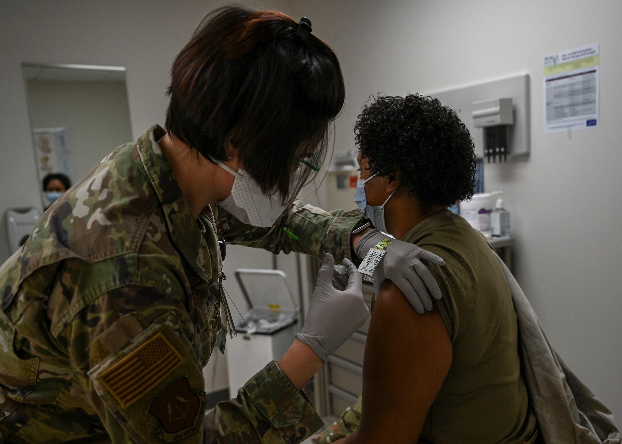 Airman getting COVID-19 vaccine