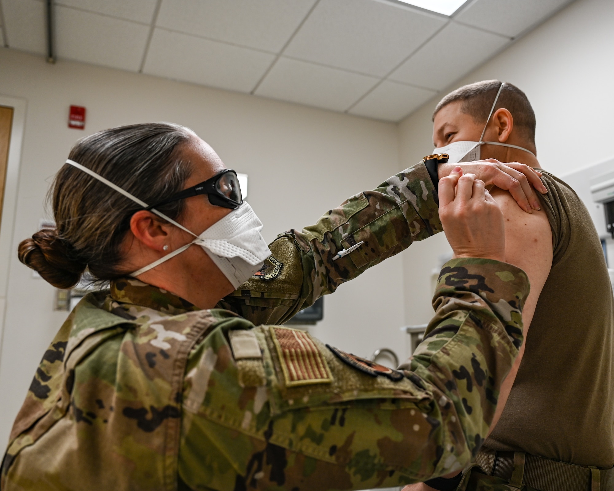 Photo of Airman getting vaccine