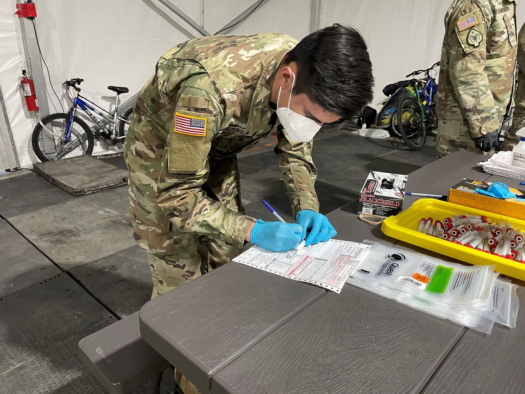 Nevada National Guardsmen conducted a sample collection site for COVID-19 testing in downtown Reno Jan. 7, 2021, after Washoe County Health District officials noticed an uptick in cases among homeless people in shelters.
