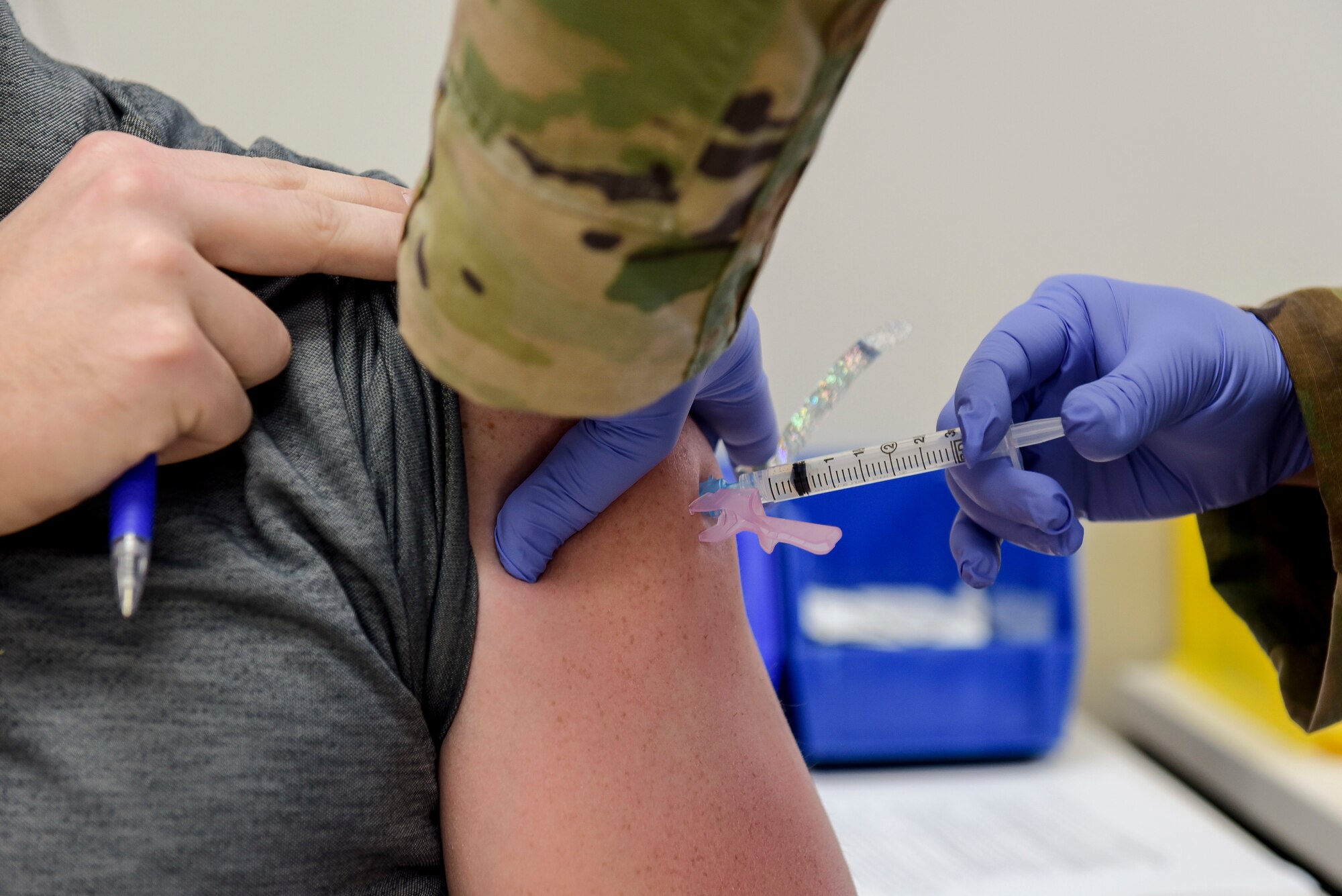 A COVID-19 vaccine is given to a member of the 27th Special Operations Wing at Cannon Air Force Base, N.M., Jan. 7, 2021. 20 personnel were given the vaccine with more planned in the following days. (U.S. Air Force photo by Senior Airman Vernon R. Walter III)