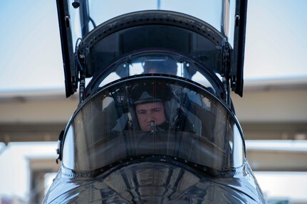 U. S. Air Force Maj. Bede Bolin, 415th Flight Test Flight T-38 command chief pilot, inspects a T-38 before its test flight at Joint Base San Antonio-Randolph, Dec. 1, 2020. Pilots practice safety by inspecting each section of the aircraft prior to flight.