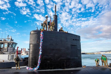 PEARL HARBOR, Hawaii (Dec. 15, 2020) - The Los Angeles-class fast-attack submarine USS Topeka (SSN 754) arrives in Pearl Harbor, Hawaii, after completing a change of homeport from Guam, Dec. 15. Topeka’s ability to support a multitude of missions, including anti-submarine warfare, anti-surface ship warfare, strike warfare, surveillance and reconnaissance, has made Topeka one of the most capable submarines in the world. (U.S. Navy Photo by Lorilyn Cravalho/Released)
