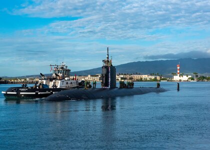 PEARL HARBOR, Hawaii (Dec. 15, 2020) - The Los Angeles-class fast-attack submarine USS Topeka (SSN 754) arrives in Pearl Harbor, Hawaii, after completing a change of homeport from Guam, Dec. 15. Topeka’s ability to support a multitude of missions, including anti-submarine warfare, anti-surface ship warfare, strike warfare, surveillance and reconnaissance, has made Topeka one of the most capable submarines in the world. (U.S. Navy Photo by Lorilyn Cravalho/Released)