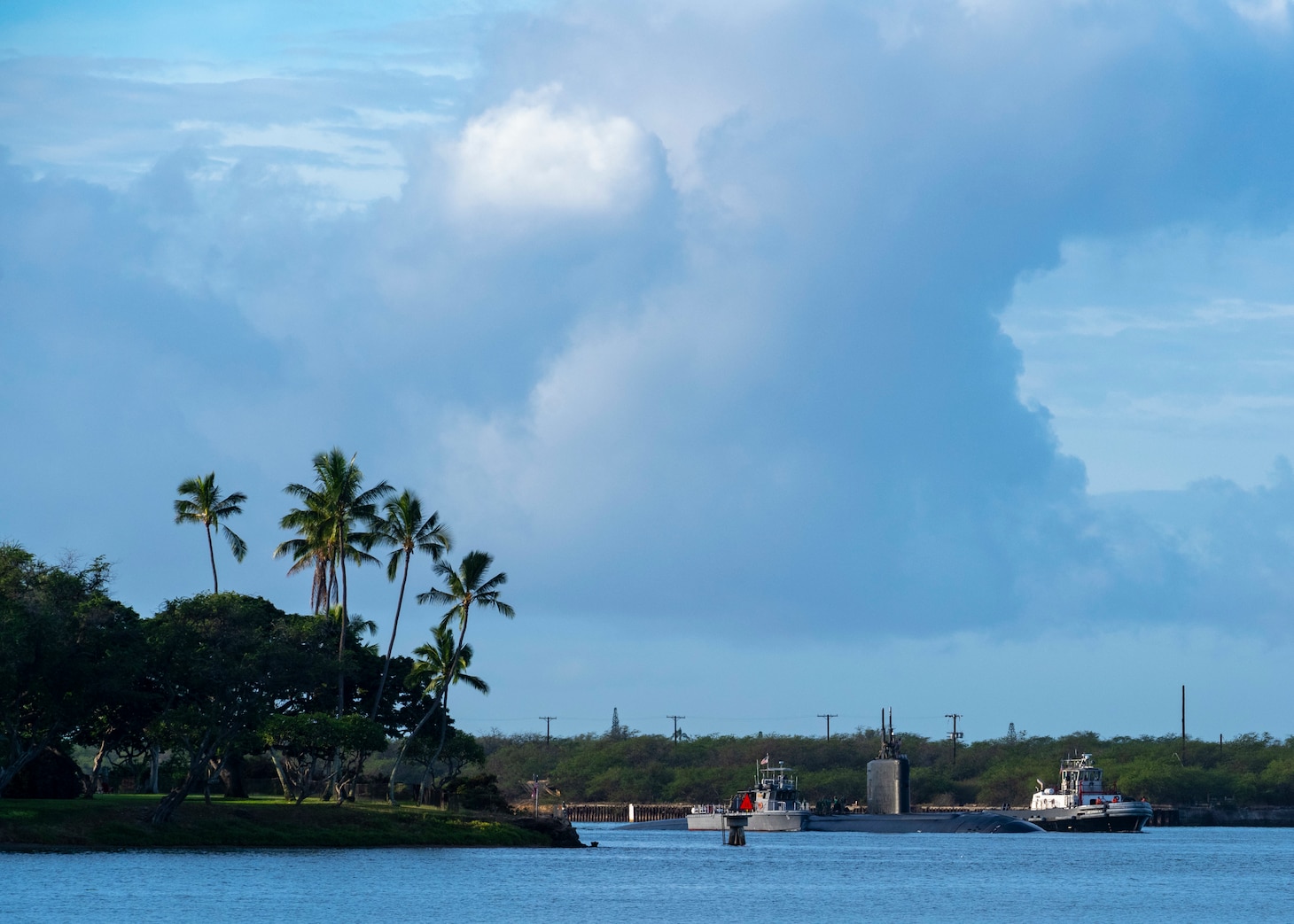 PEARL HARBOR, Hawaii (Dec. 15, 2020) - The Los Angeles-class fast-attack submarine USS Topeka (SSN 754) arrives in Pearl Harbor, Hawaii, after completing a change of homeport from Guam, Dec. 15. Topeka’s ability to support a multitude of missions, including anti-submarine warfare, anti-surface ship warfare, strike warfare, surveillance and reconnaissance, has made Topeka one of the most capable submarines in the world. (U.S. Navy Photo by Chief Mass Communication Specialist Amanda R. Gray/Released)