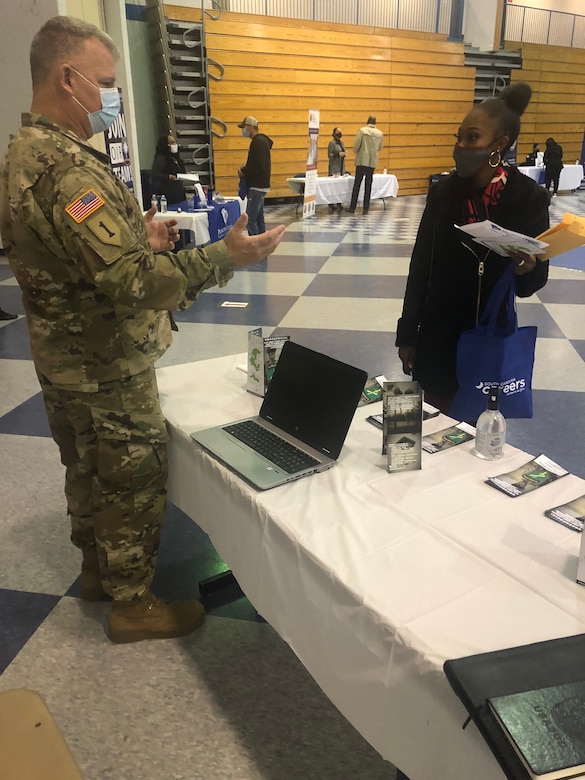 U.S. Army Reserve Command Sgt. Maj. George H. Conklin, senior enlisted adviser for the 354th Civil Affairs Brigade, and part of the U.S. Army Civil Affairs and Psychological Operations Command (Airborne) Task Force Manning Program, provides information about opportunities in the Civil Affairs, Psychological Operations, and Information Operations career fields during the Fort Jackson Soldier For Life Transition Assistance Program (SFL-TAP) recruiting event at the Robert B. Solomon Activity Center, Fort Jackson, S.C., on Dec. 1, 2020. The Task Force Manning Program is a recruiting initiative to recruit, retain, and qualify current active duty, Army Reserve, and National Guard service members into the Civil Affairs, Psychological Operations, and Information Operations career fields under USACAPOC(A) to fill critical vacancy shortages.