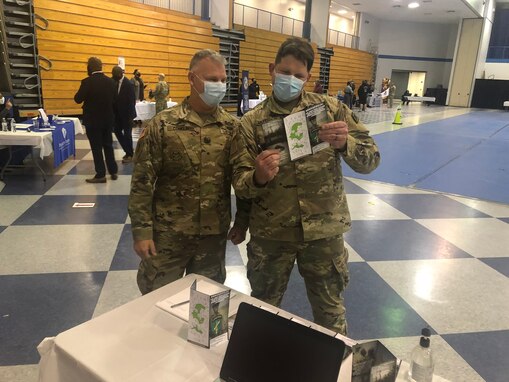 U.S. Army Reserve Command Sgt. Maj. George H. Conklin, senior enlisted adviser for the 354th Civil Affairs Brigade, and part of the U.S. Army Civil Affairs and Psychological Operations Command (Airborne) Task Force Manning Program, provides information about opportunities in the Civil Affairs, Psychological Operations, and Information Operations career fields during the Fort Jackson Soldier For Life Transition Assistance Program (SFL-TAP) recruiting event at the Robert B. Solomon Activity Center, Fort Jackson, S.C., on Dec. 1, 2020. The Task Force Manning Program is a recruiting initiative to recruit, retain, and qualify current active duty, Army Reserve, and National Guard service members into the Civil Affairs, Psychological Operations, and Information Operations career fields under USACAPOC(A) to fill critical vacancy shortages.