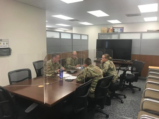 The 15th Aircraft Maintenance Squadron’s Health, and Readiness Optimization Team meets during COVID-19 to plan health initiatives for Airmen at Joint Base Pearl Harbor-Hickam, Hawaii, Nov. 4, 2020. The HeRO Team is part of an Air Force-wide Health Promotion program that uses data to target negative health habits in squadrons and combat them. (Courtesy Photo)