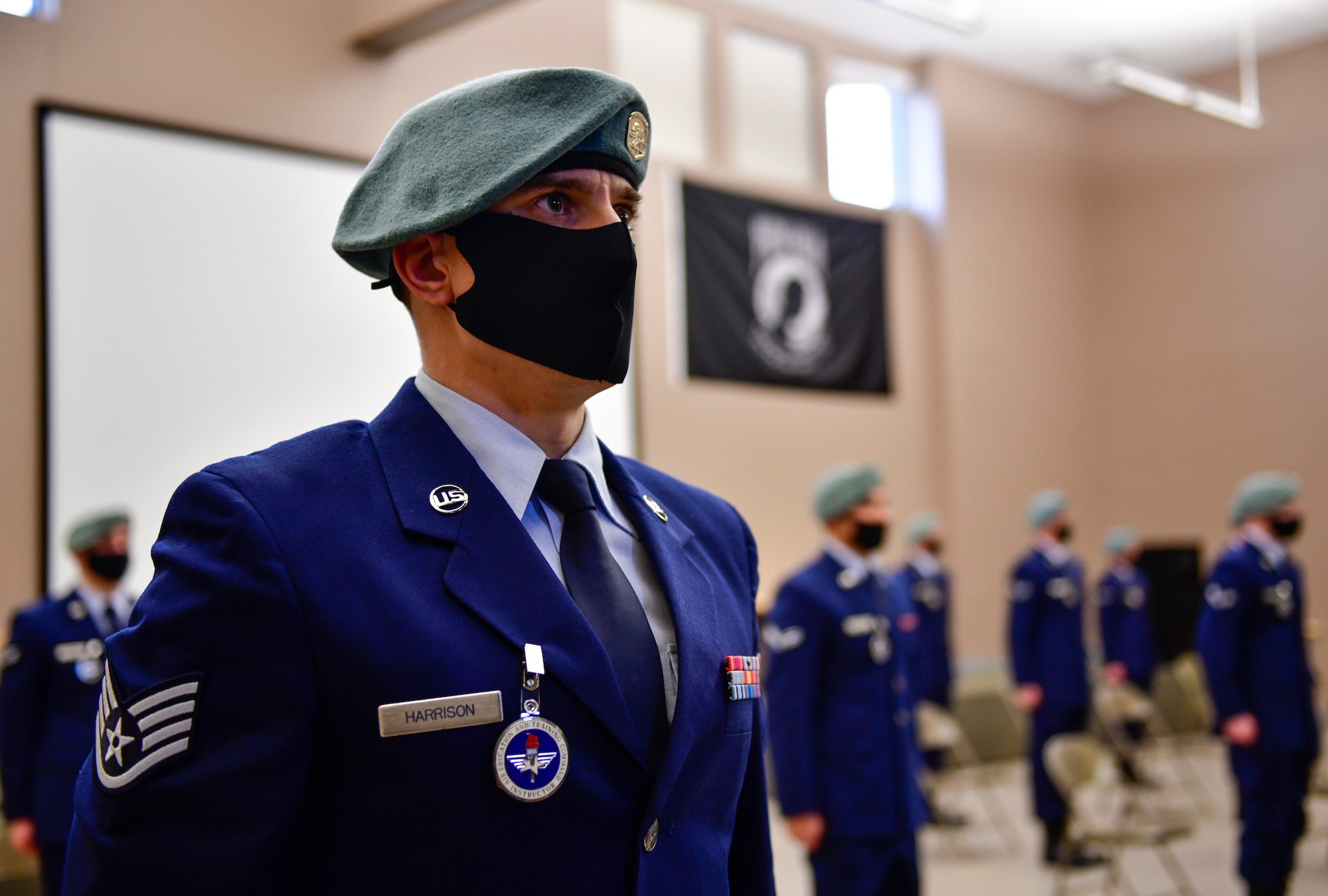 U.S. Air Force Staff Sgt. Dillon Harrison, 66th Training Squadron Survival, Evasion, Resistance and Escape specialist, stands in formation during a SERE Specialist Apprentice Course graduation ceremony at Fairchild Air Force Base, Washington, January 8, 2021. Harrison was the team leader for class 21-01, which holds the lowest attrition rate in years at only 7 percent in contrast to the average 50 percent. (U.S. Air Force photo by Senior Airman Ryan Gomez)
