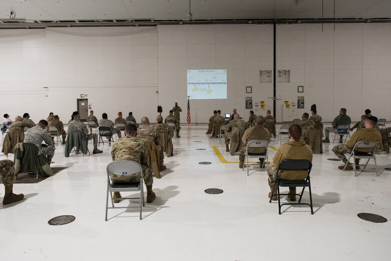 U.S. Air Force Tech. Sgt. Nicholas Fonzo, 509th Maintenance Squadron low observable aircraft structural maintenance section chief, gives a briefing on fatigue countermeasures during a commander’s call at Whiteman Air Force Base, Missouri, Dec. 15, 2020. Airman’s Edge focuses on topics such as improving sleep, building purpose and meaning within the workplace, perspective taking, safe firearm storage, and building unit cohesion to improve the moral and welfare of the whole squadron. (U.S. Air Force photo by Airman 1st Class Christina Carter)