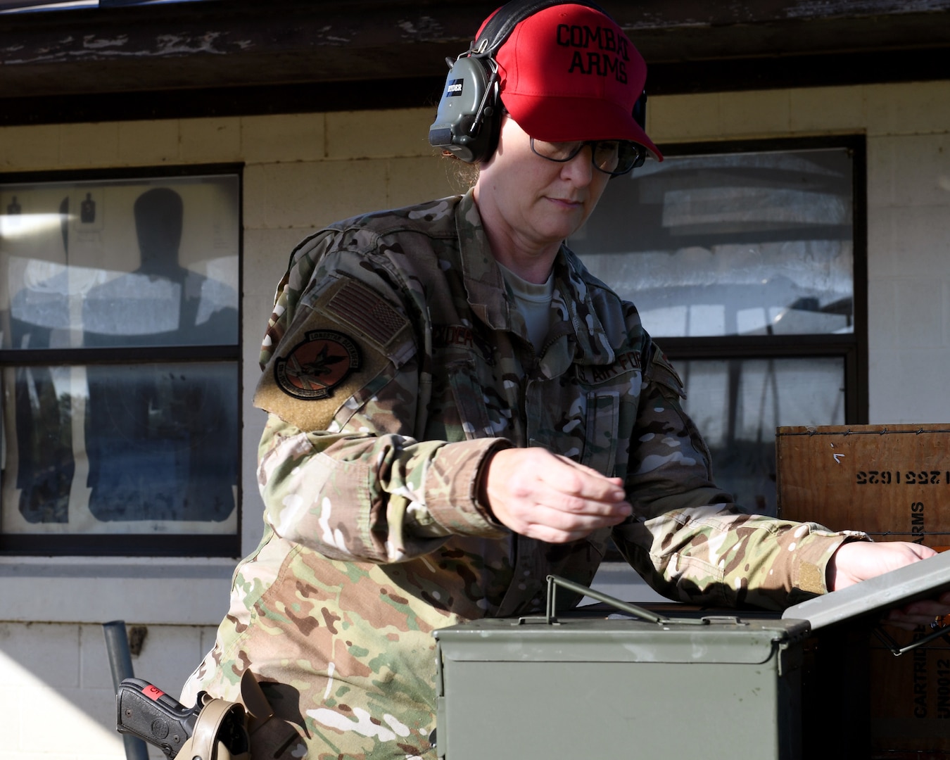 Staff Sgt. Tina Ryder, an Air National Guard Combat Arms instructor from the 149th Security Forces Squadron, prepares for weapons qualification training at a firing range on Joint Base San Antonio’s Medina Annex May 27, 2020.